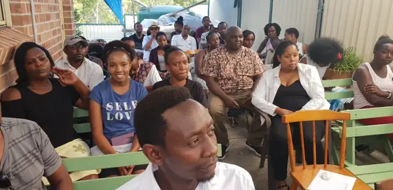 Members seated at a UKACA community meeting